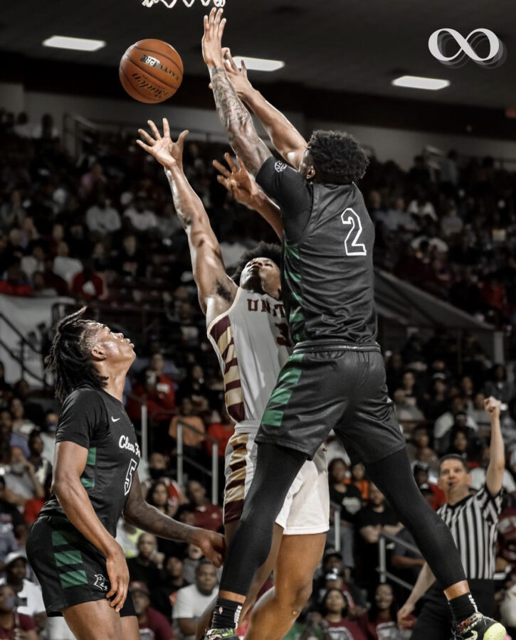 Corey Kelly, senior, goes up to block as Josh Moore, senior looks on in the the game agains Beaumont United in the UIL Regional Finals.  Photo by Ballfinityy - follow @ballfinityy on instagram